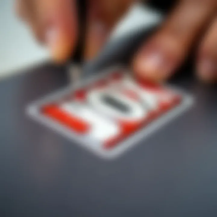 Detailed Application of Box Logo Sticker A close-up of a box logo sticker being applied to a surface, highlighting the intricacies of the design.