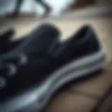 Sleek Design of Black Slip-On Converse Close-up view of black slip-on Converse showcasing their sleek design.