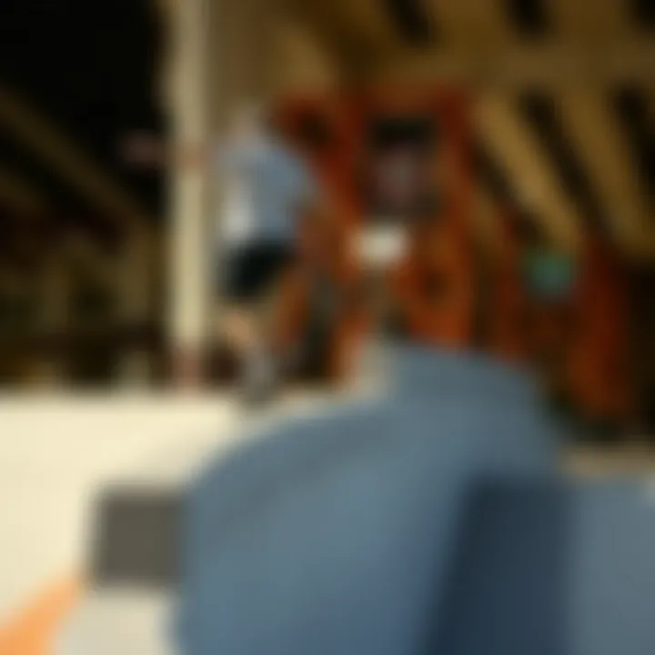 Skater in Action on Element Skateboard Rail Skater performing a trick on the Element skateboard rail