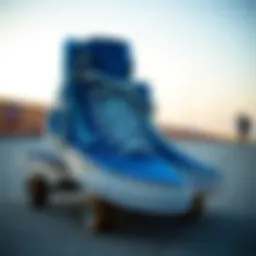 Stylish blue suede Vans high tops on a skateboard