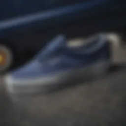 Close-up view of navy blue platform Vans highlighting the texture and stitching