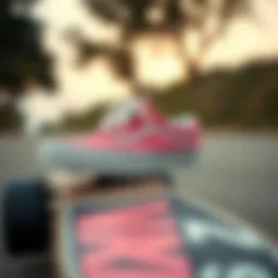 Vibrant pink and white Vans on a skateboard