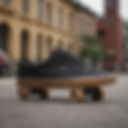 Black Vans sneakers displayed on a skateboard, showcasing their design and functionality.