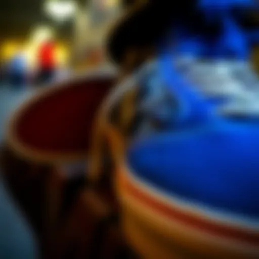 Close-up view of blue Vans with checkered rims showcasing their unique design