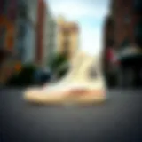 Classic white high-top Converse sneakers on a vibrant urban background