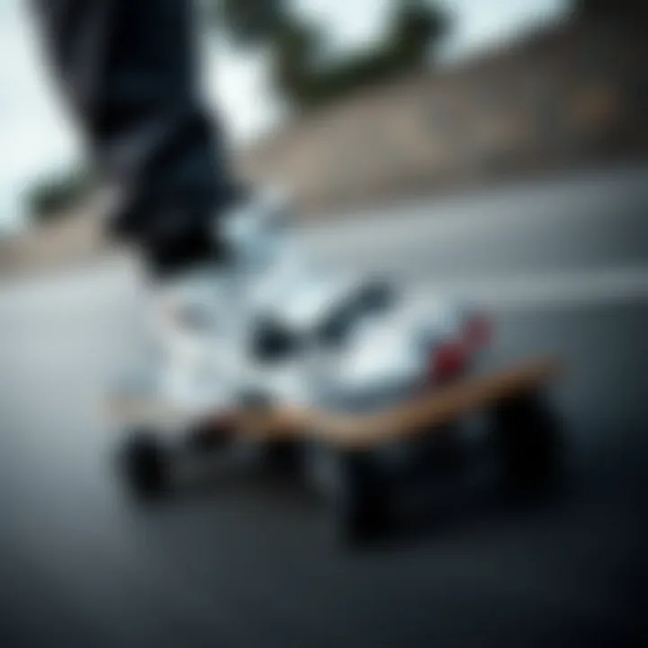 The Fila Disruptor 2 in black and white on a skateboard