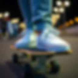 Stylish pair of ladies white Vans on a skateboard