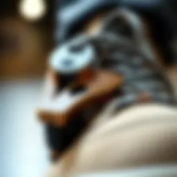 A close-up view of a skate lace puller showcasing its unique design and features.