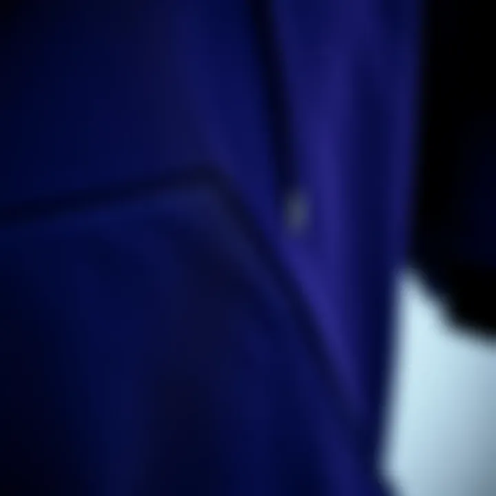 Material Matters: Textures of the Black Purple Hoodie Close-up of fabric texture and details of a black purple hoodie.