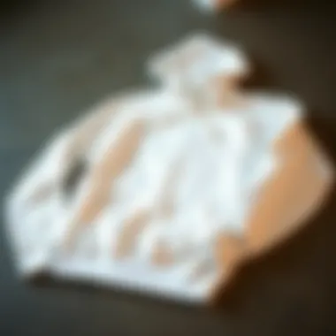 Caring for Your All White Hoodie Maintenance tips for caring an all white hoodie laid out on a surface