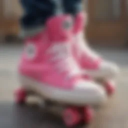 Close-up of pink high top Chucks on a skateboard