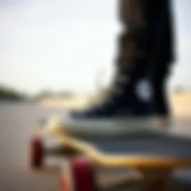 Black High Top Chucks on Skateboard A pair of black high top Chucks on a skateboard