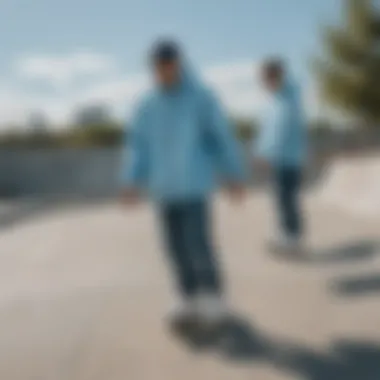 An urban skate park setting with skateboarders wearing light blue windbreakers