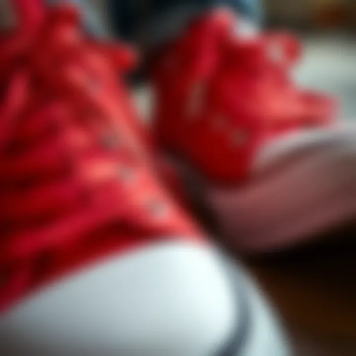 Detailed Design of Red Converse Sneakers A close-up of red Converse shoes with intricate detailing
