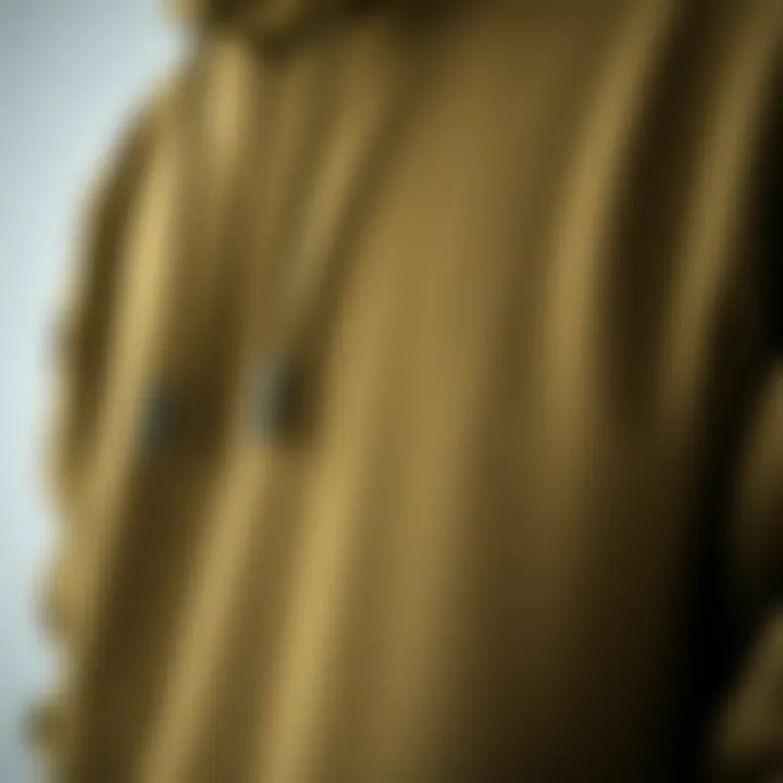 Close-Up of Olive Hoodie Fabric Texture Close-up of fabric texture of an olive hoodie
