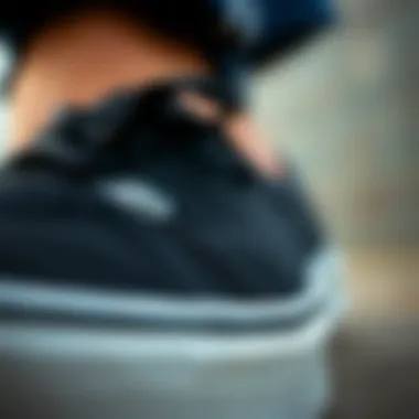 Close-up of the Vans Authentic Black shoe design highlighting its texture